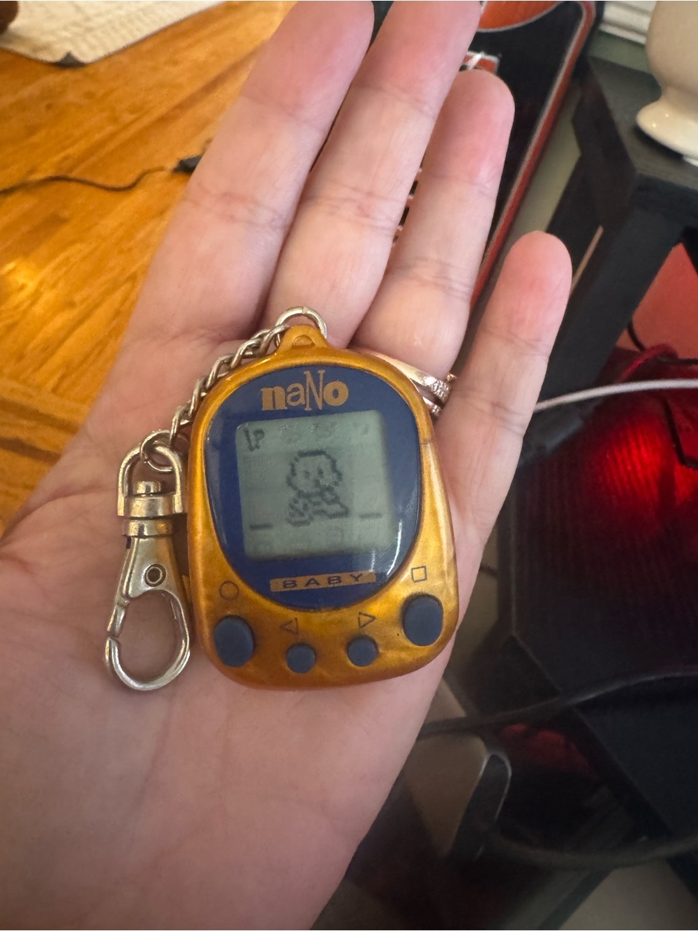 Nano Baby 1997 Virtual Pet Keychain - Metallic Gold with Blue Screen- no sound